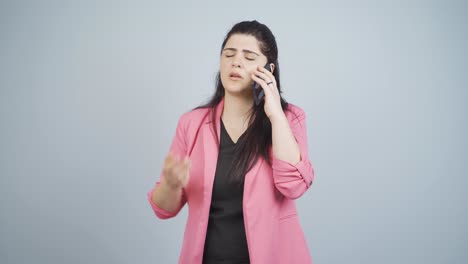Angry-talking-business-woman-on-the-phone.